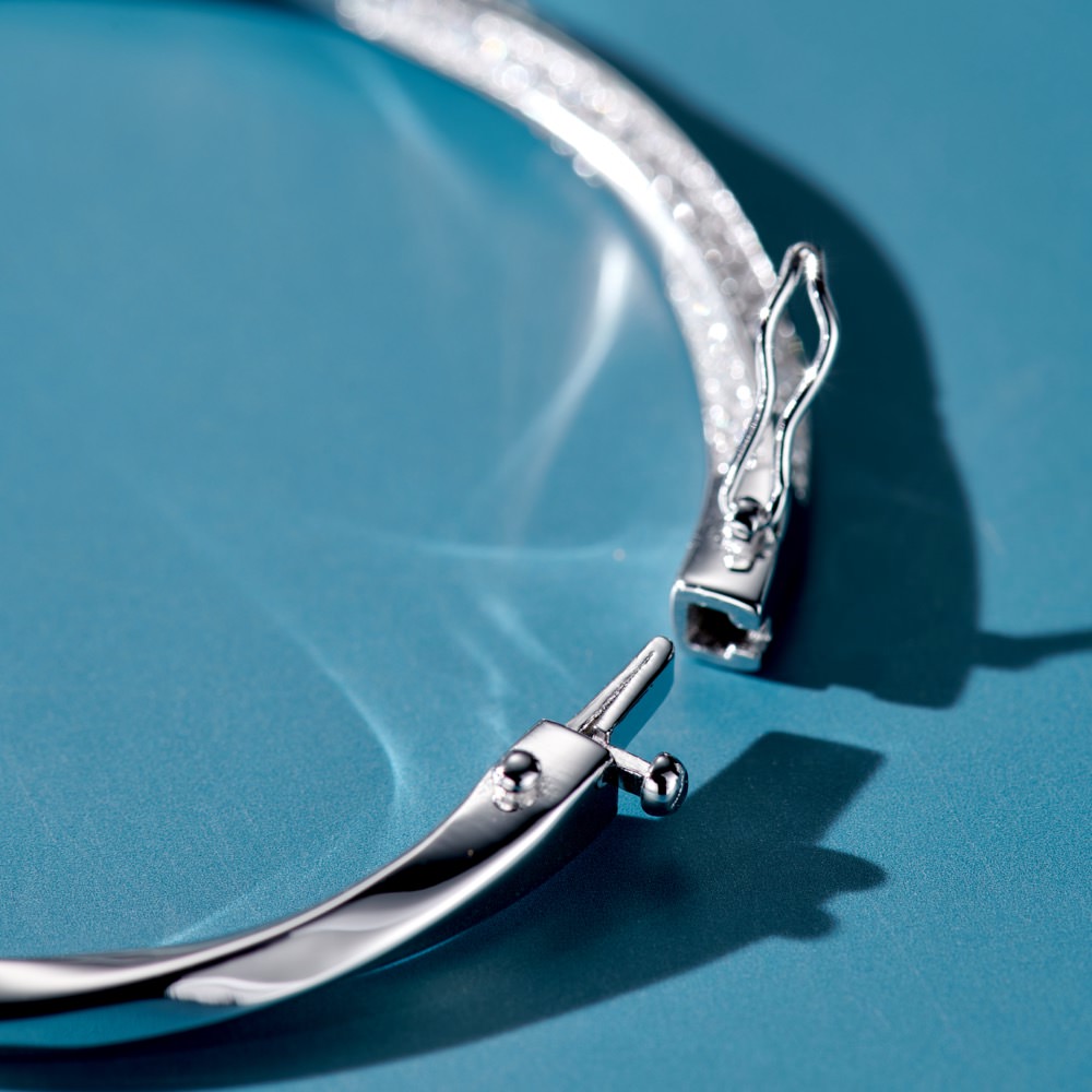 Sterling Silver Twisted Bangle Bracelet with Pavé-Set Cubic Zirconia
