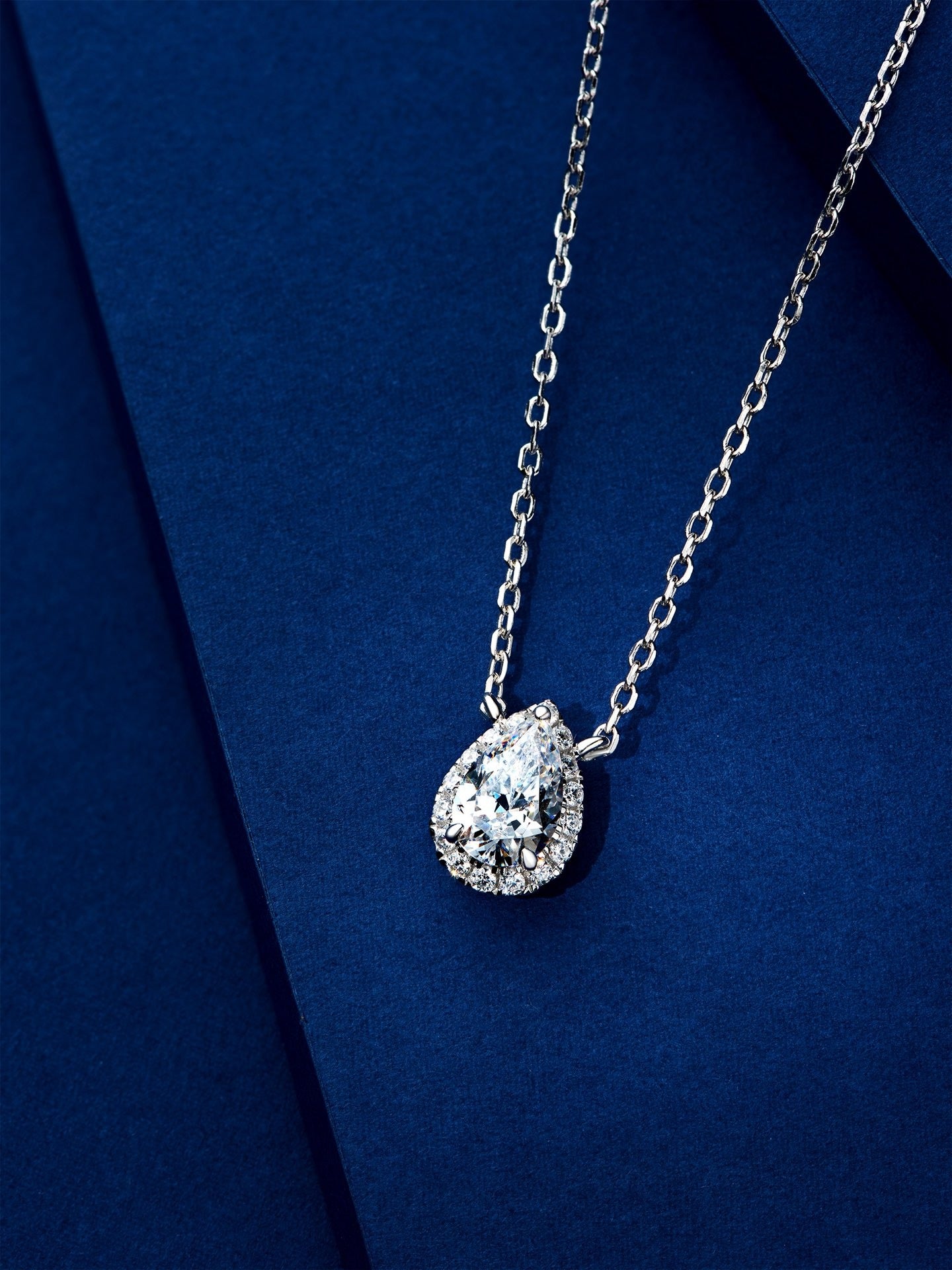 Sterling Silver Pear Cut Halo Pendant Necklace with 6x9mm Cubic Zirconia,